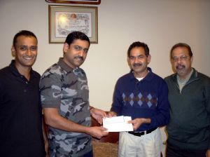 c59-Accepting the First Cheque for the Association from Joseph Issac.jpg